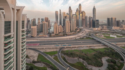 Dubai Marina highway intersection spaghetti junction night to day timelapse