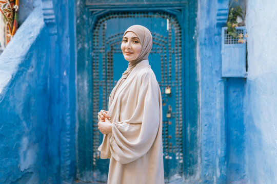 Woman in a hijab posing for the camera