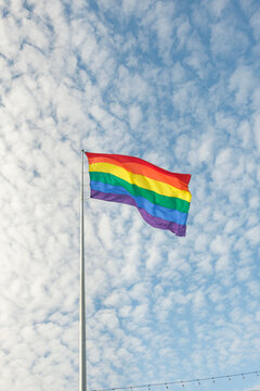 Rainbow Pride Flag with Blue Sky