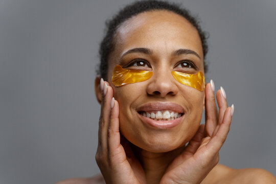 A woman with a patch under her eyes 