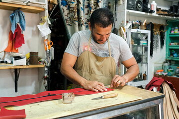 Latino worker in the workshop