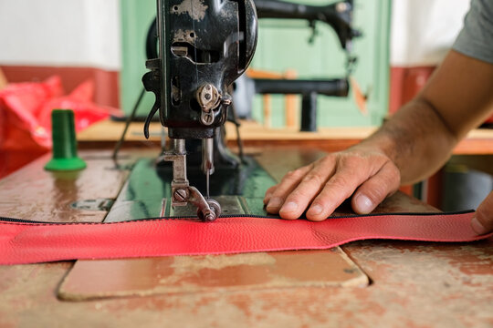 Dressmaker working at a sewing machine