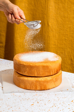 Two sponge cakes one on top of the other