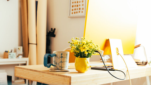 Home Office With Flowers and Coffee