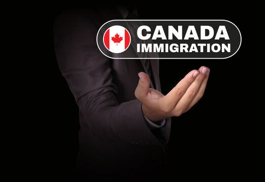 Canada Immigration backdrop with a person's hand and typography along with Flag. Immigration to Canada concept background