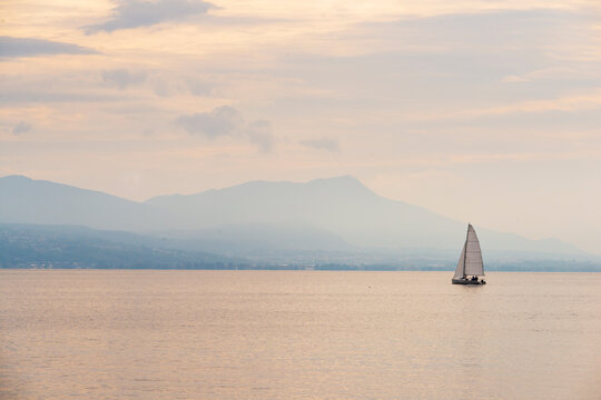 In Lake Geneva, a sailboat
