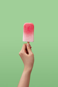 Strawberry and milk ice cream with a green background