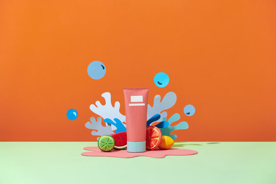 Cosmetic product mockups flying on paper cut water splashes