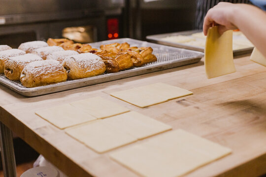 Baker Making Pastries in a Bakery Kitchen