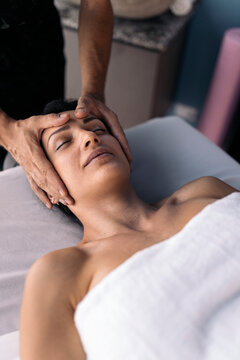 Relaxed woman on a massage treatment