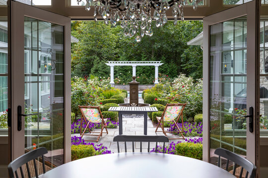 Backyard Luxury Garden view from  open door of home 