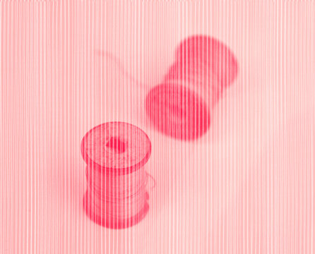 Monotone red spools of thread with white yarn-like lines overlaid 