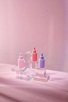 Skincare and cosmetic products on crystal podiums