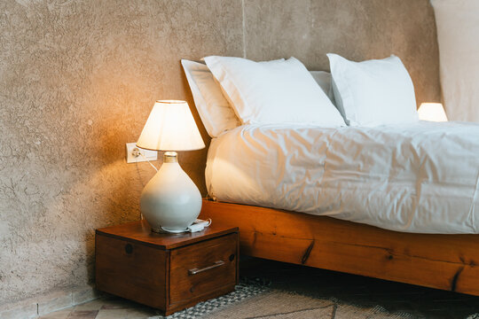 Bed and lamp in luxury tent