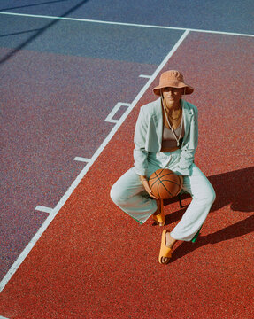 Analog Color Portrait of Fashionable Woman on Basketball Court