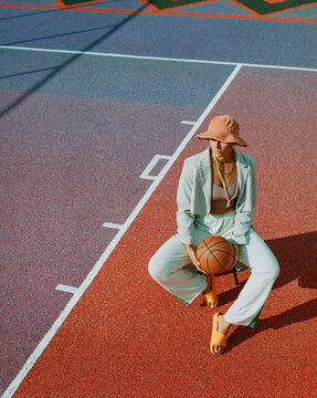 Analog Color Portrait of Fashionable Young Woman on Basketball C