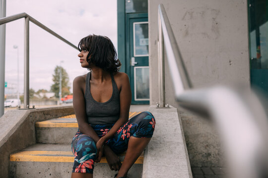 Candid portraits of young woman on the street.
