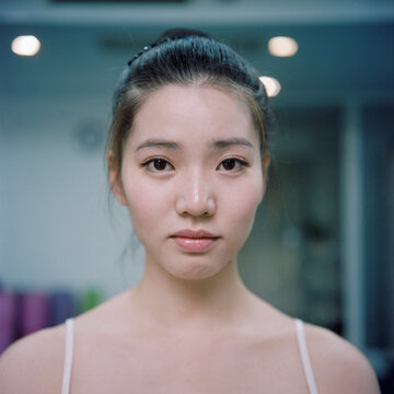 The front face of a woman in a halter suit