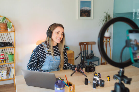 A woman smile during a broadcast