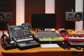 Sound production equipment in production studio.