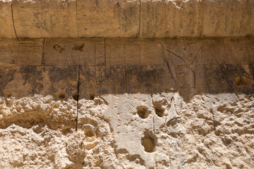 Ancient inscriptions of hieroglyphs in the Oracle Temple in Siwa Oasis, Egypt