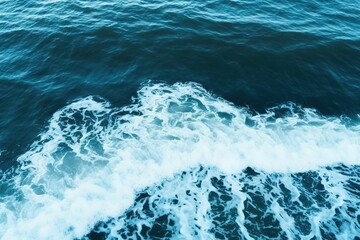 Obraz premium wave of water, sea surface with waves of white sea foam