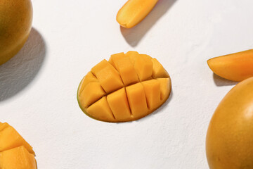 Fresh ripe mangoes on white  background