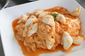 Stir Fried crab meat with curry powder. ฆeafood cuisine and food travel. Thai food thai cuisine food on dish, Copy space.