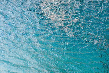 Abstract background of water surface. Beautiful natural summer holiday background. with blue water waves, season of vacations