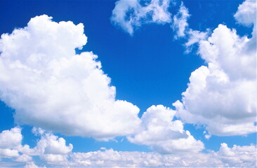 Obraz na płótnie Canvas 青空と浮かぶ白い雲