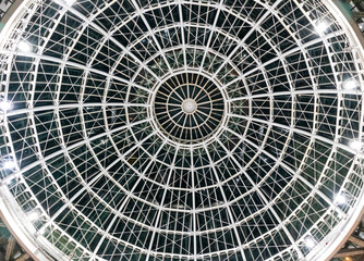 Glass dome or round window in the roof. Architectural fashion motifs in modern construction.