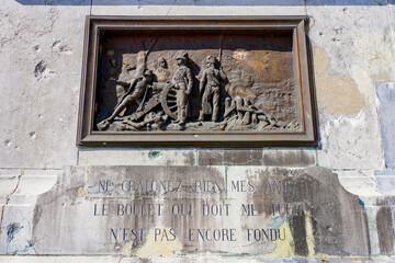 Bronze plaque on the pedestal of the equestrian statue of Napoleon on the Legion of Honor Square in the town of Montereau Fault Yonne in Seine et Marne, France