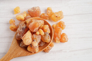 Frankincense or olibanum aromatic resin used in incense and perfumes.
