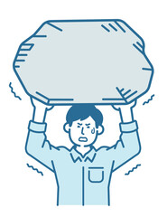 岩を持ち上げる男性