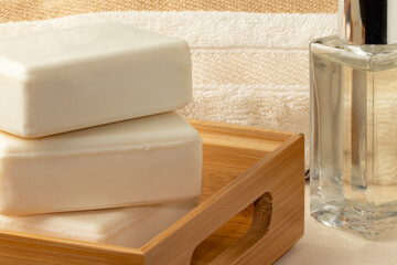 Obraz na płótnie Canvas Organic soap bars in a bamboo box.