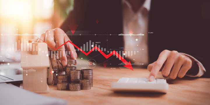 concept of interest rates and dividends ,Interest rate decline graph ,Financial interest rates ,economic recession ,stock market ,finance and investment ,percentage increase in debt ,interest burden