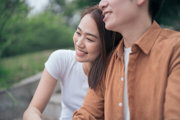 Fototapeta premium Photo of young Asian couple outside