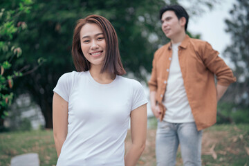Obraz premium Photo of young Asian couple outside