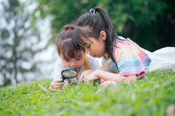Photo of young Asian baby girl playing at park