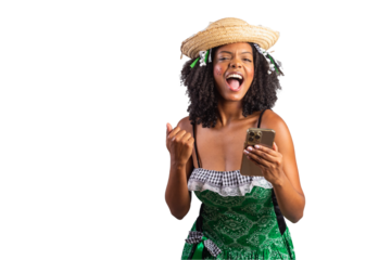 portrait, Black Brazilian woman in festa junina clothes. Saint John's festival. holding Smartphone, celebrating.
