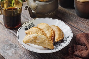 Traditional Curry Puff or Malay people called Karipap filled with potato filling