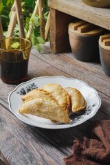 Traditional Curry Puff or Malay people called Karipap filled with potato filling