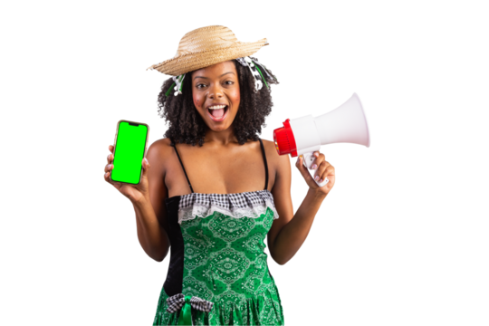 portrait, Black Brazilian woman in festa junina clothes. Saint John's festival. holding Smartphone and megaphone.