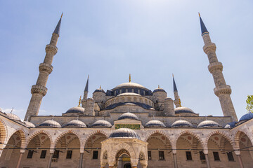 Fototapeta na wymiar The Sultan Ahmet Mosque or Blue Mosque close up front view from the courtyard in Istanbul, Turkey