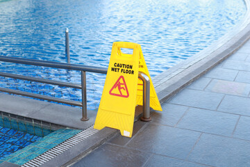 wet floor sign in swimming pool