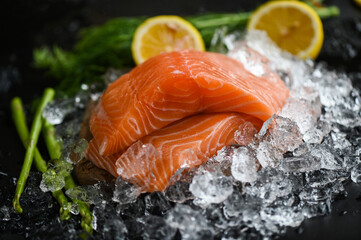 salmon fillet with lemon asparagus herb and spices, fresh raw salmon fish on ice for cooking food seafood salmon fish