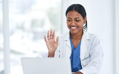 Hand, hello and woman doctor on laptop video call for online consulting, help and advice in a hospital. Telehealth, hi and female healthcare expert on virtual consult or medical conference on space