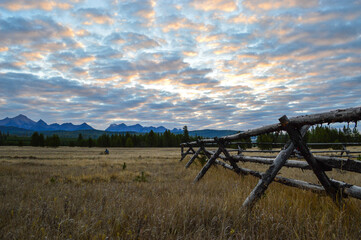 Sunrise Over Rail Fence