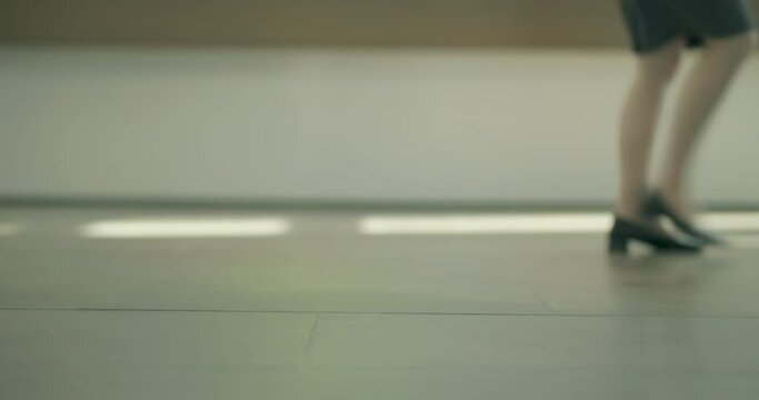  feet of the people walking in the lobby