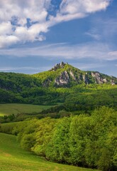 Fototapeta premium Beautiful Sulov rocks with forests around during the summer in national nature reserve Sulov rocks in Slovakia